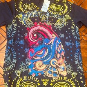 New with tags Christian Audigier t shirt XXL fits like a Large.